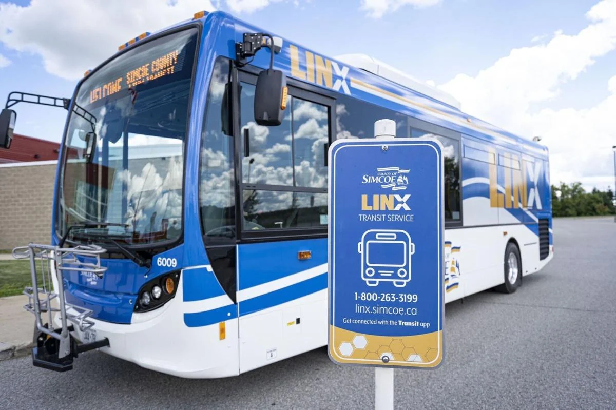 A blue public transit bus. 