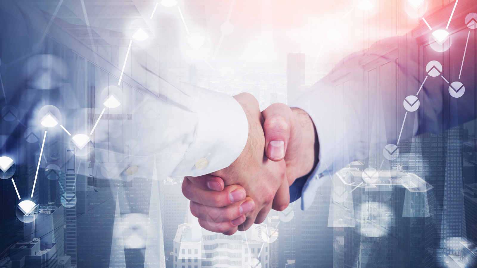 A stock image of two people shaking hands. 