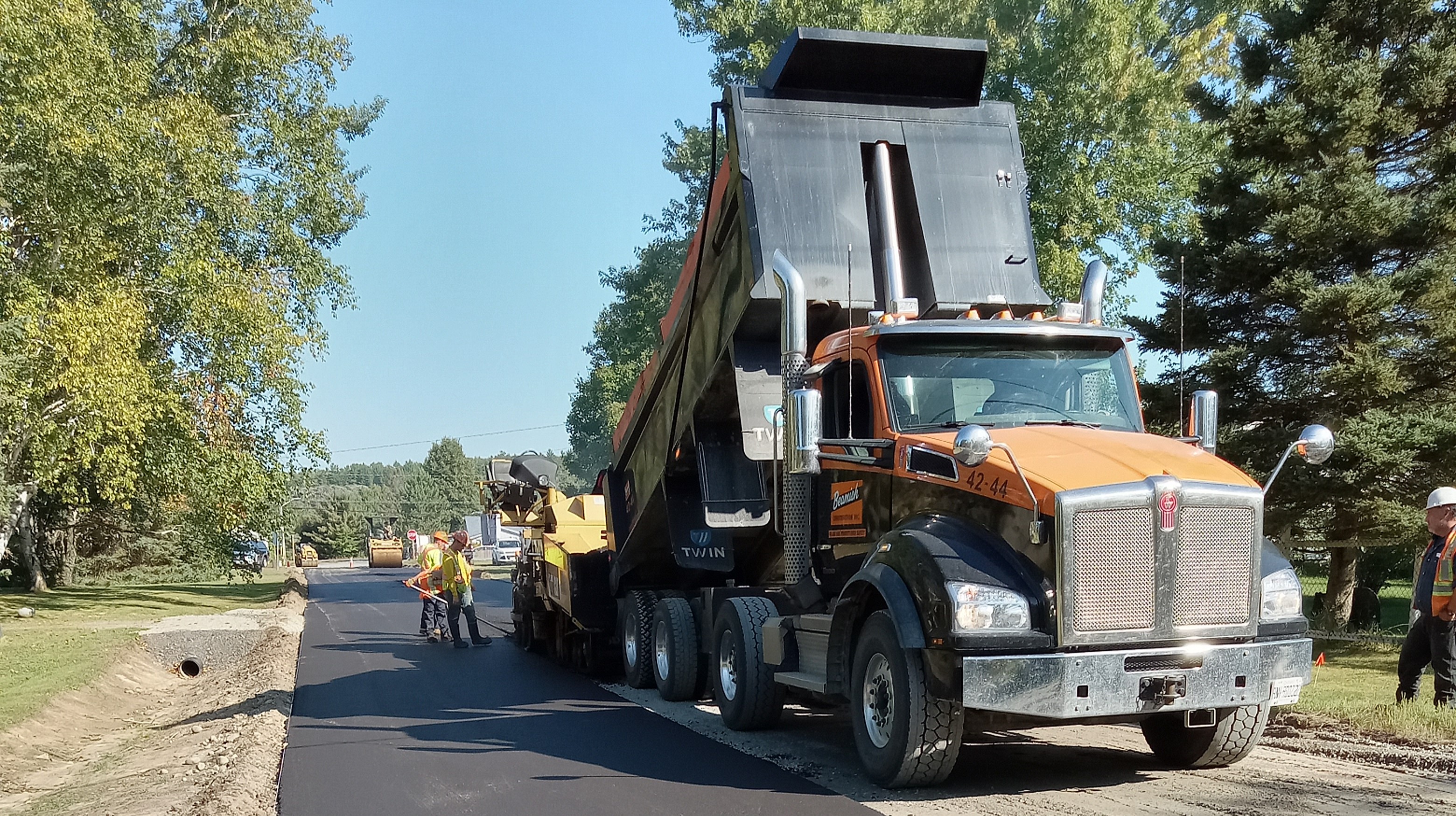 Township crews repaving a road