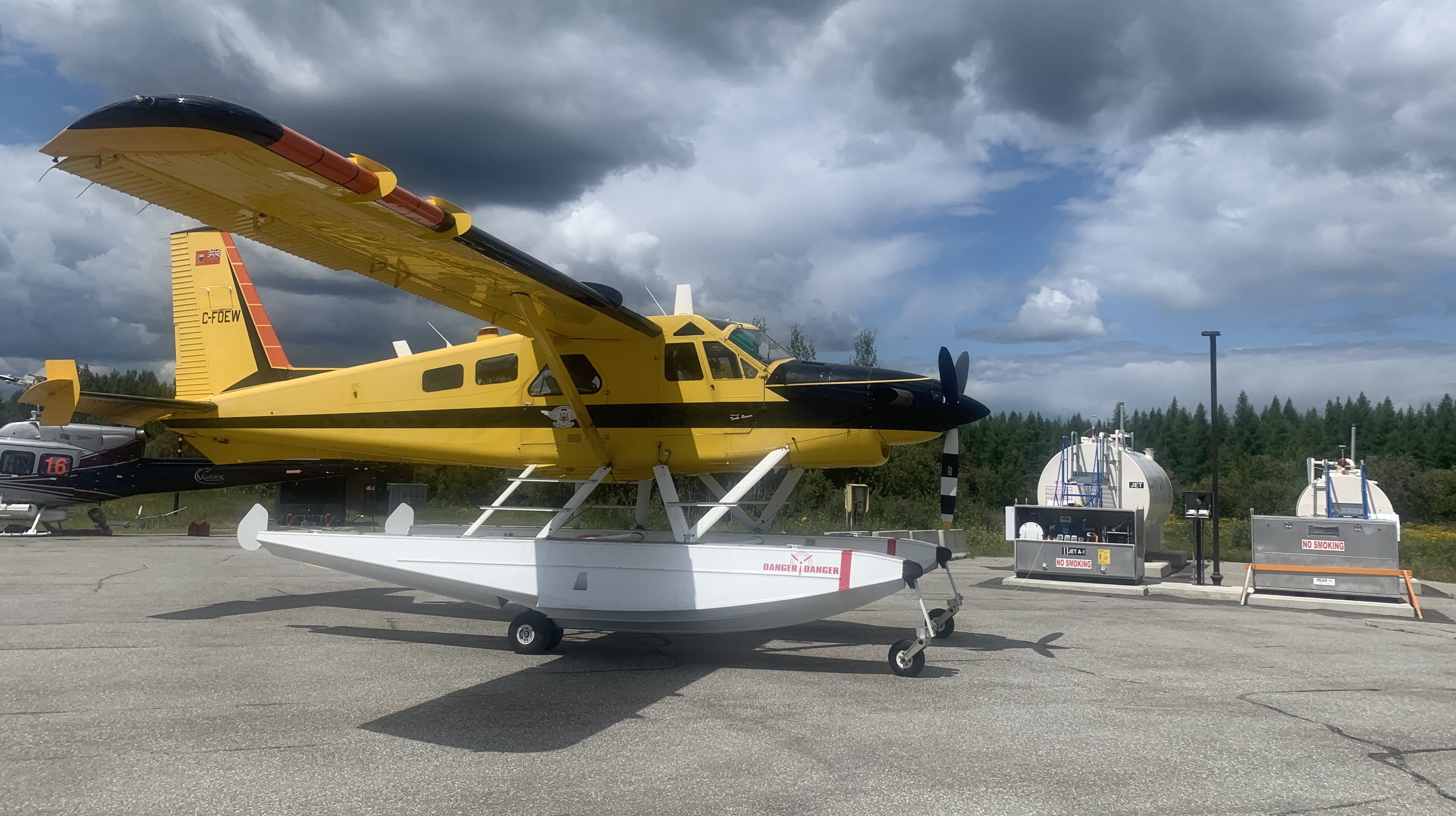 A plane in the foreground, with the new fuel distribution system in the background