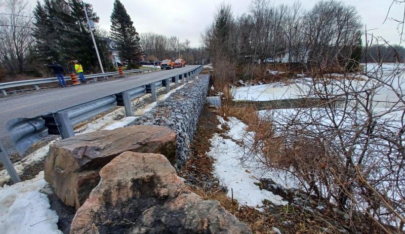 A culvert running underneath a road