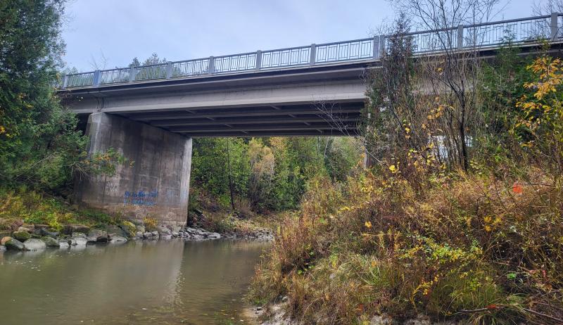 A view from the side of Bell Bridge, running over the water.