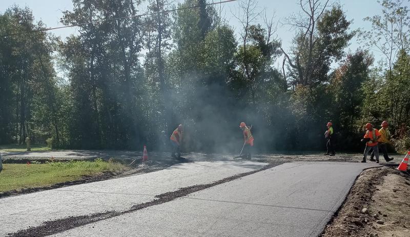 Township crews working on a road