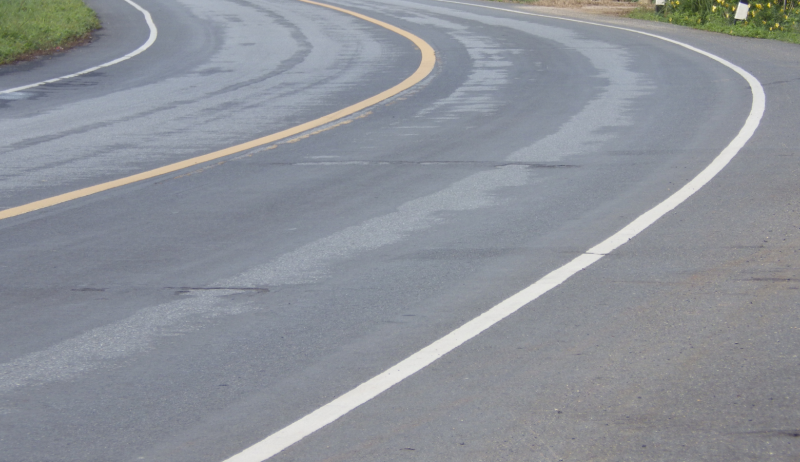 A stock photo of a paved roadway.