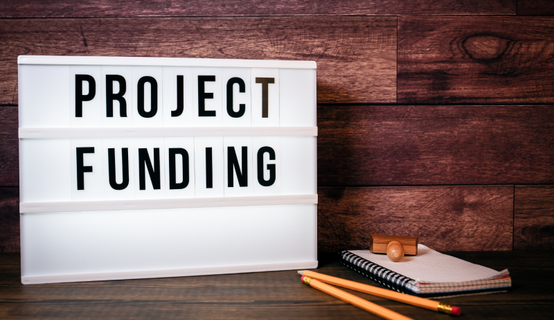 Photo of a sign that says "Project Funding".