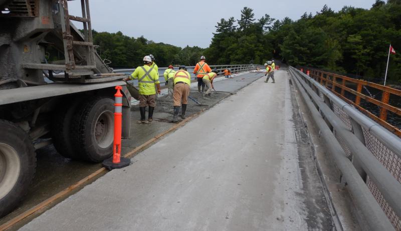 Construction workers on the Acton Island bridge. 